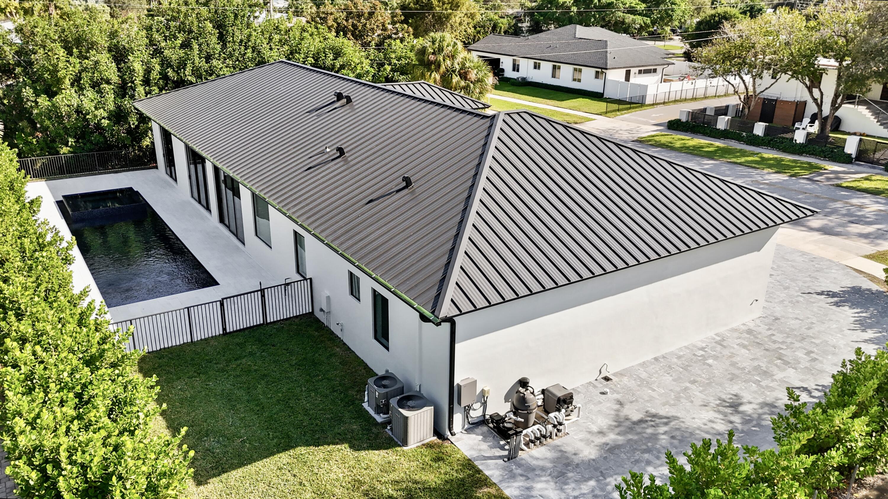 751 Pelican Way North Palm Beach, FL 33408 - Photo 35 of 39 a aerial view of a house with a yard
