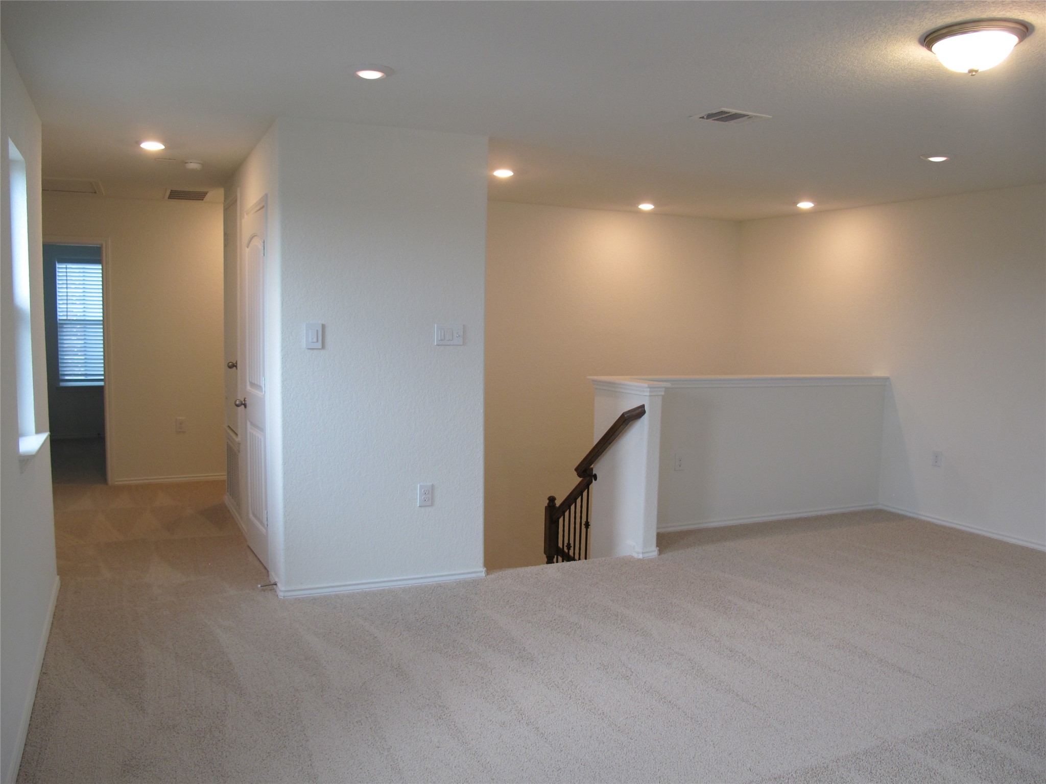 7820 Big Wind Way Austin, TX 78724 - Photo 27 of 37 a view of a livingroom with a hall