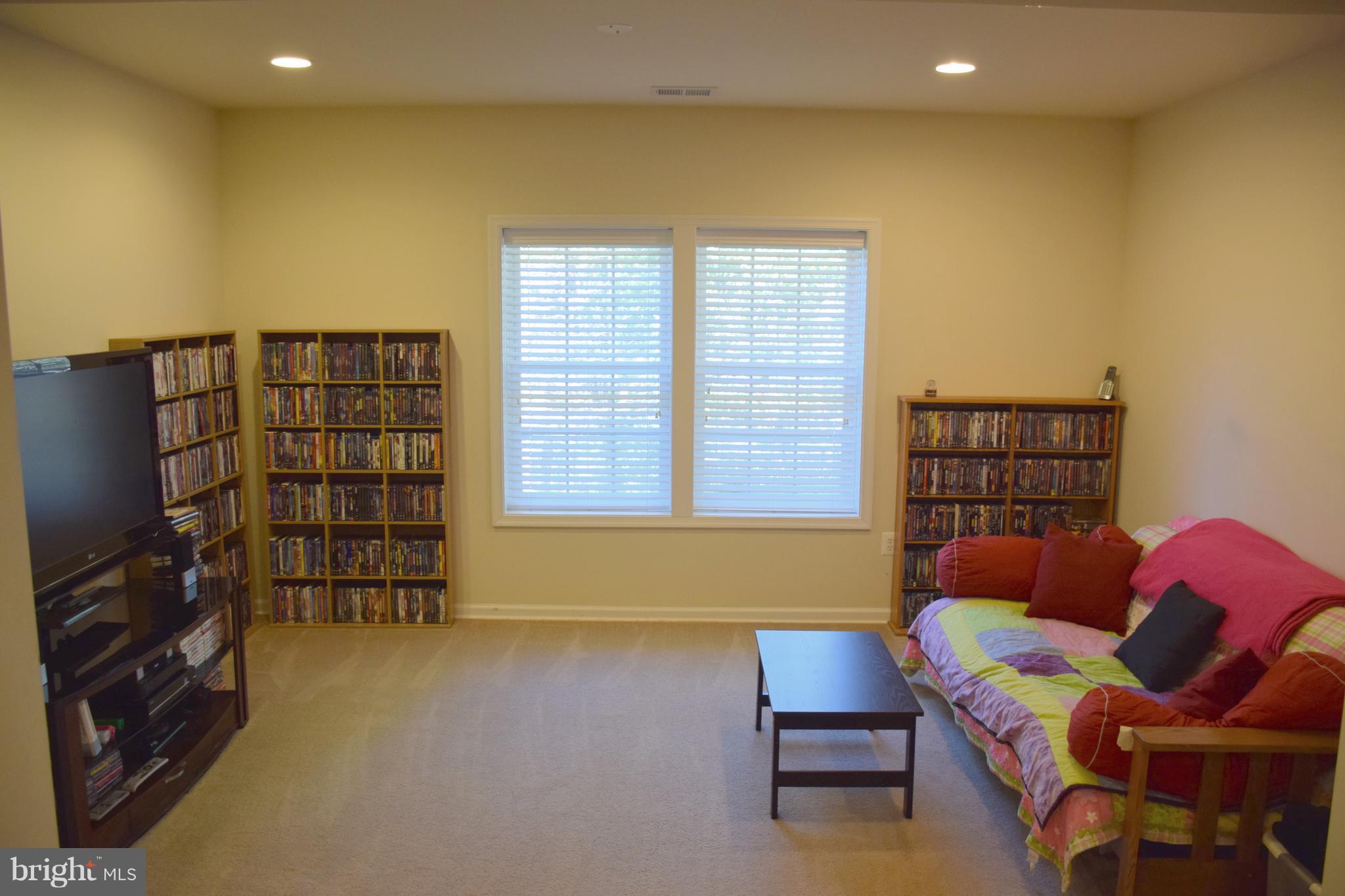250 Spring Hollow Road Front Royal, VA 22630 - Photo 22 of 30 a living room with furniture and a window