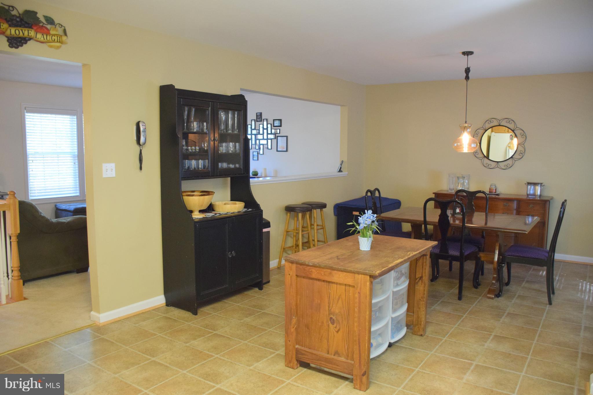250 Spring Hollow Road Front Royal, VA 22630 - Photo 5 of 30 a view of a dining room with furniture