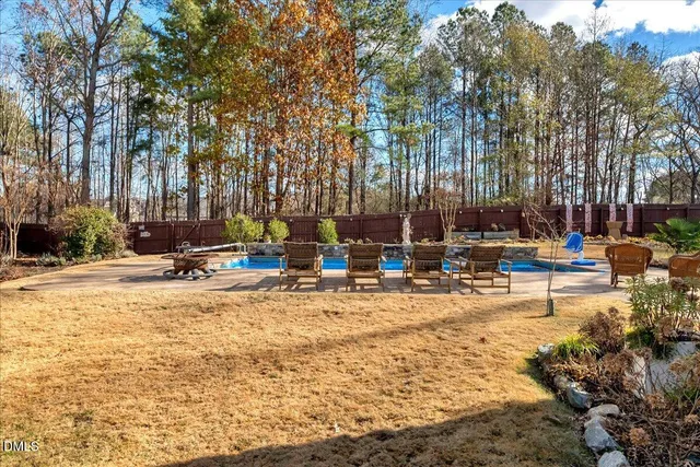 a view of water with palm trees