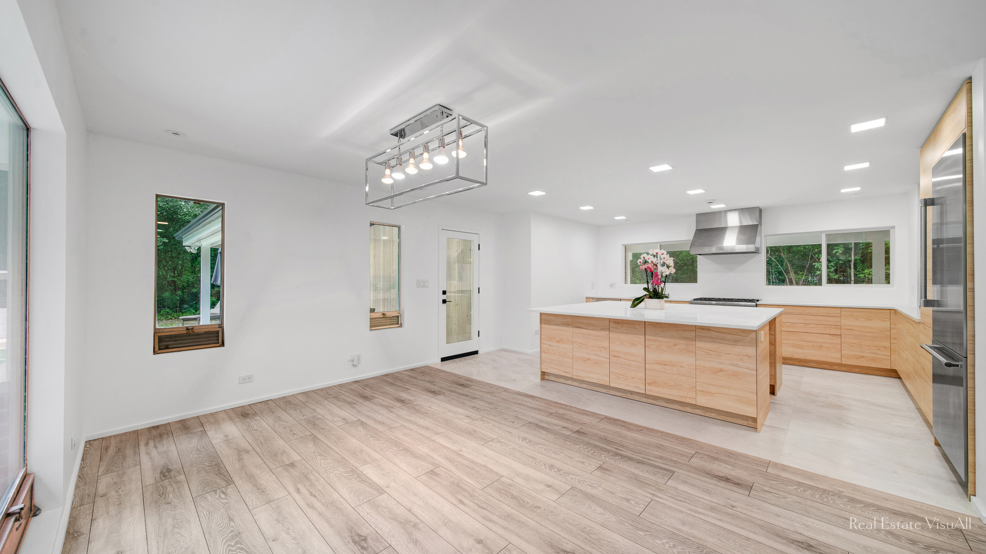 2610 Ridge Road Highland Park, IL 60035 - Photo 12 of 32 a view of kitchen with kitchen island wooden floor center island and stainless steel appliances