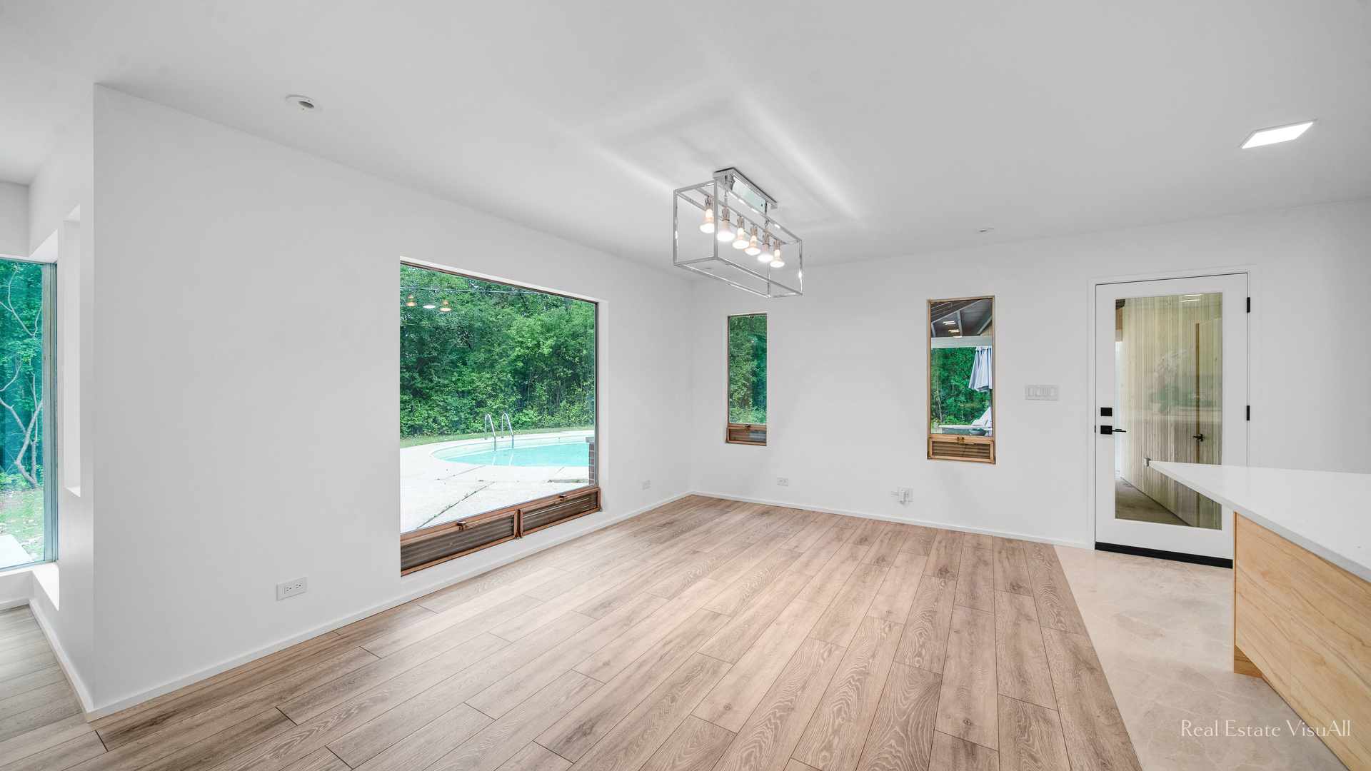 2610 Ridge Road Highland Park, IL 60035 - Photo 13 of 32 a view of an empty room with wooden floor and a window