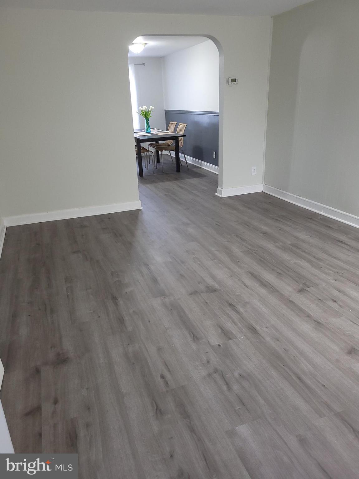 3660 Greenvale Road Baltimore, MD 21229 - Photo 8 of 20 Living room view into the dining room