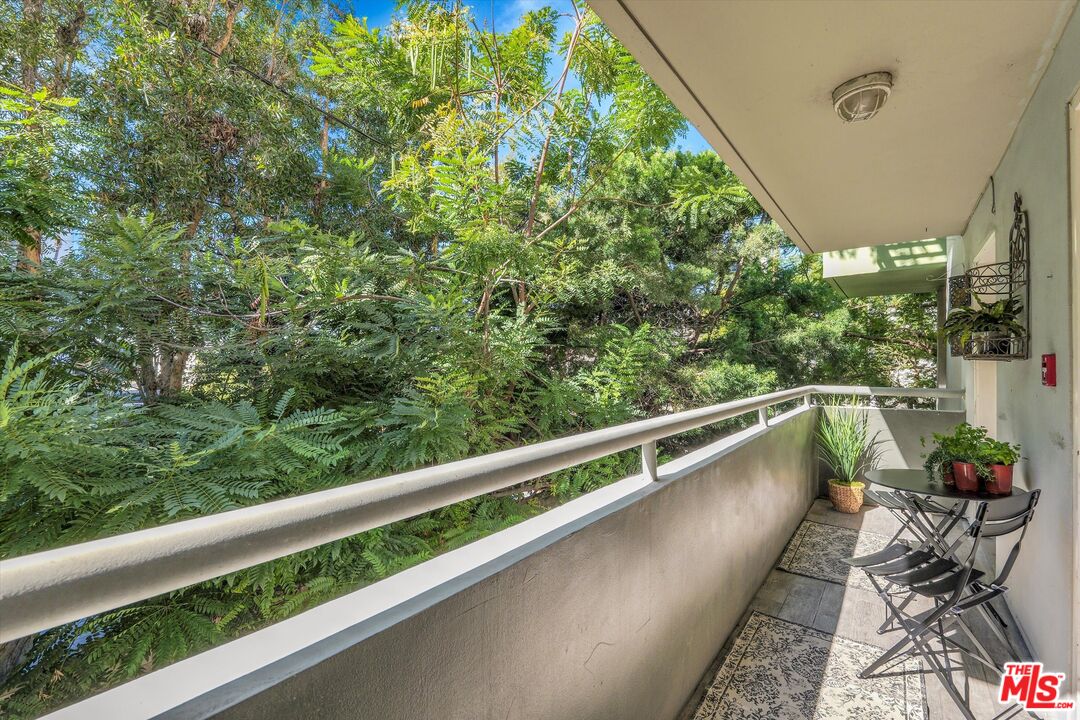 1601 South Bentley Avenue, Unit 201 Los Angeles, CA 90025 - Photo 31 of 39 a view of balcony with furniture
