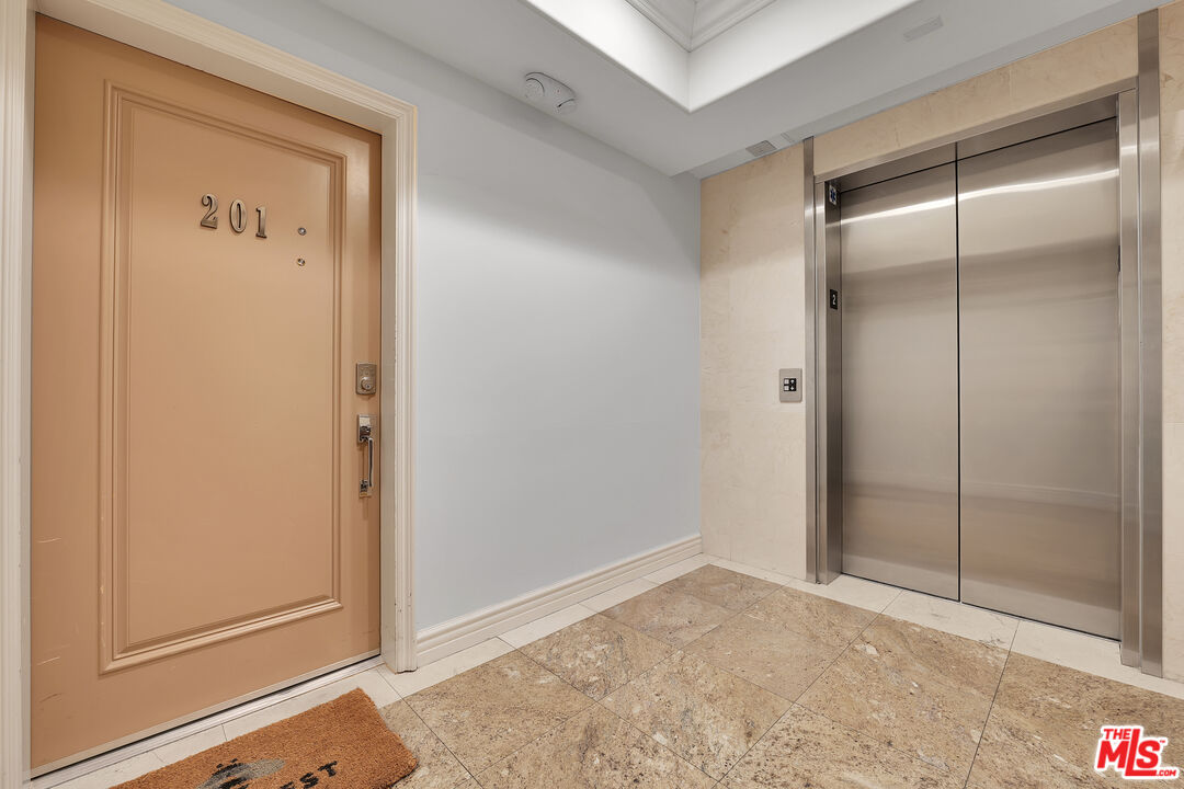 1601 South Bentley Avenue, Unit 201 Los Angeles, CA 90025 - Photo 32 of 39 a view of empty room