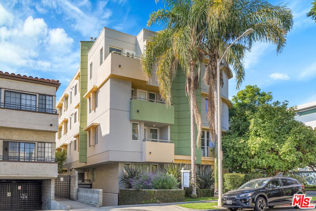 1601 South Bentley Avenue, Unit 201 Los Angeles, CA 90025 - Photo 39 of 39 a view of a street with a building in the background