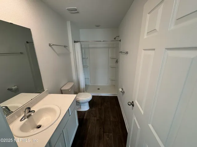 a bathroom with a sink and a toilet