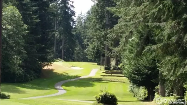 a view of a chairs and table in patio