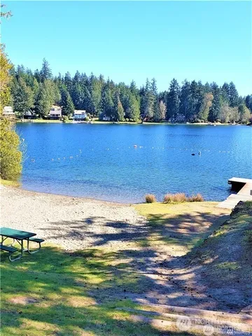 a view of a lake with a city