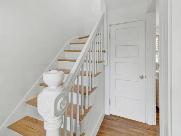 a view of entryway with wooden floor