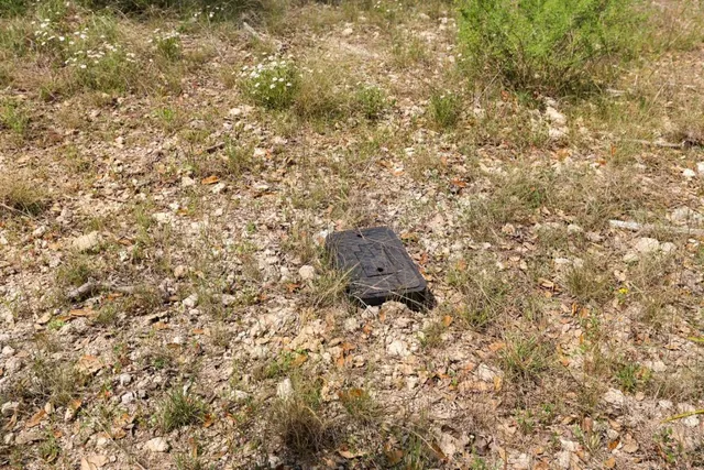 an aerial view of a multi story parking space