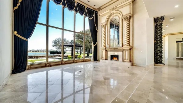 a view of an entryway with a floor to ceiling window
