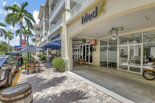 a view of a swimming pool with a garden