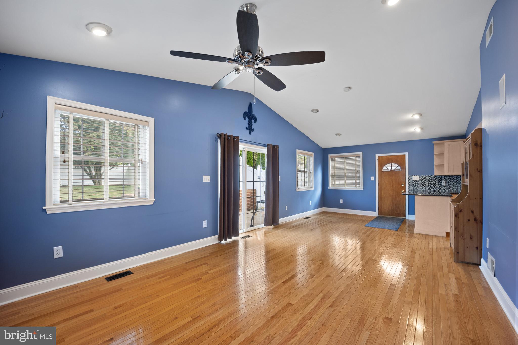 268 Beechwood Avenue Springfield, PA 19064 - Photo 13 of 36 a view of an empty room with window and wooden floor