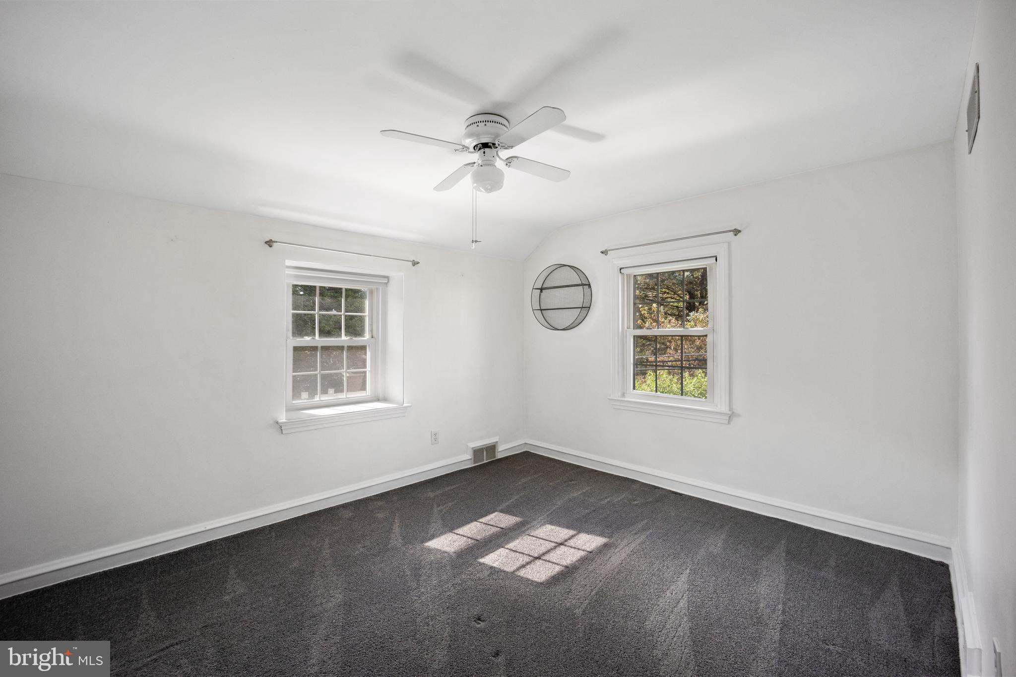 268 Beechwood Avenue Springfield, PA 19064 - Photo 18 of 36 a view of a ceiling fan and window in a room
