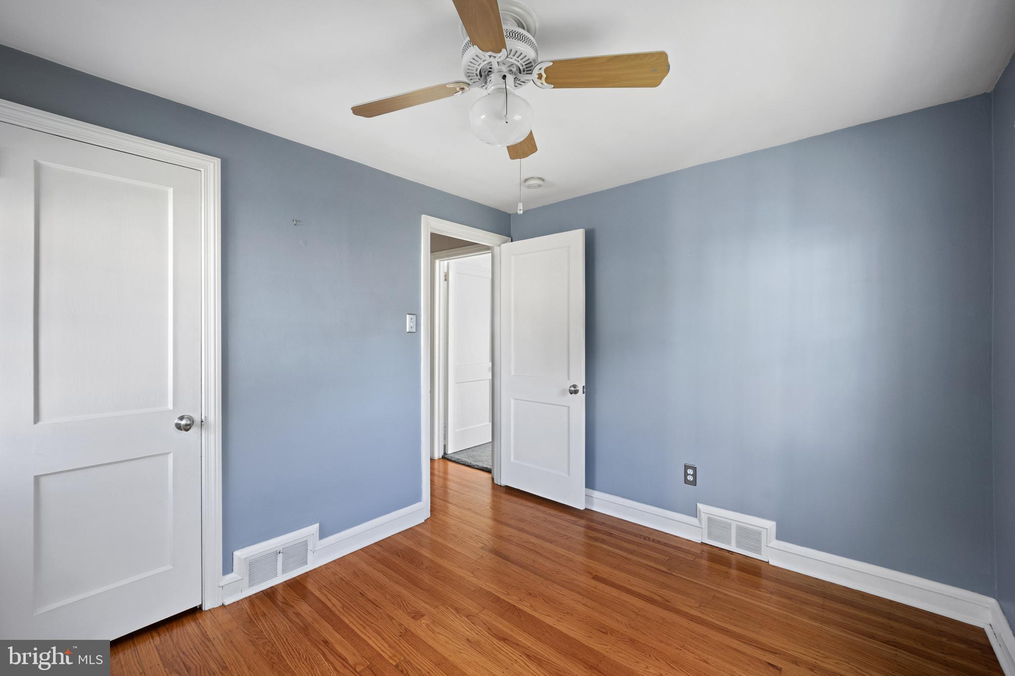 268 Beechwood Avenue Springfield, PA 19064 - Photo 21 of 36 a view of room with window wooden floor and ceiling fan