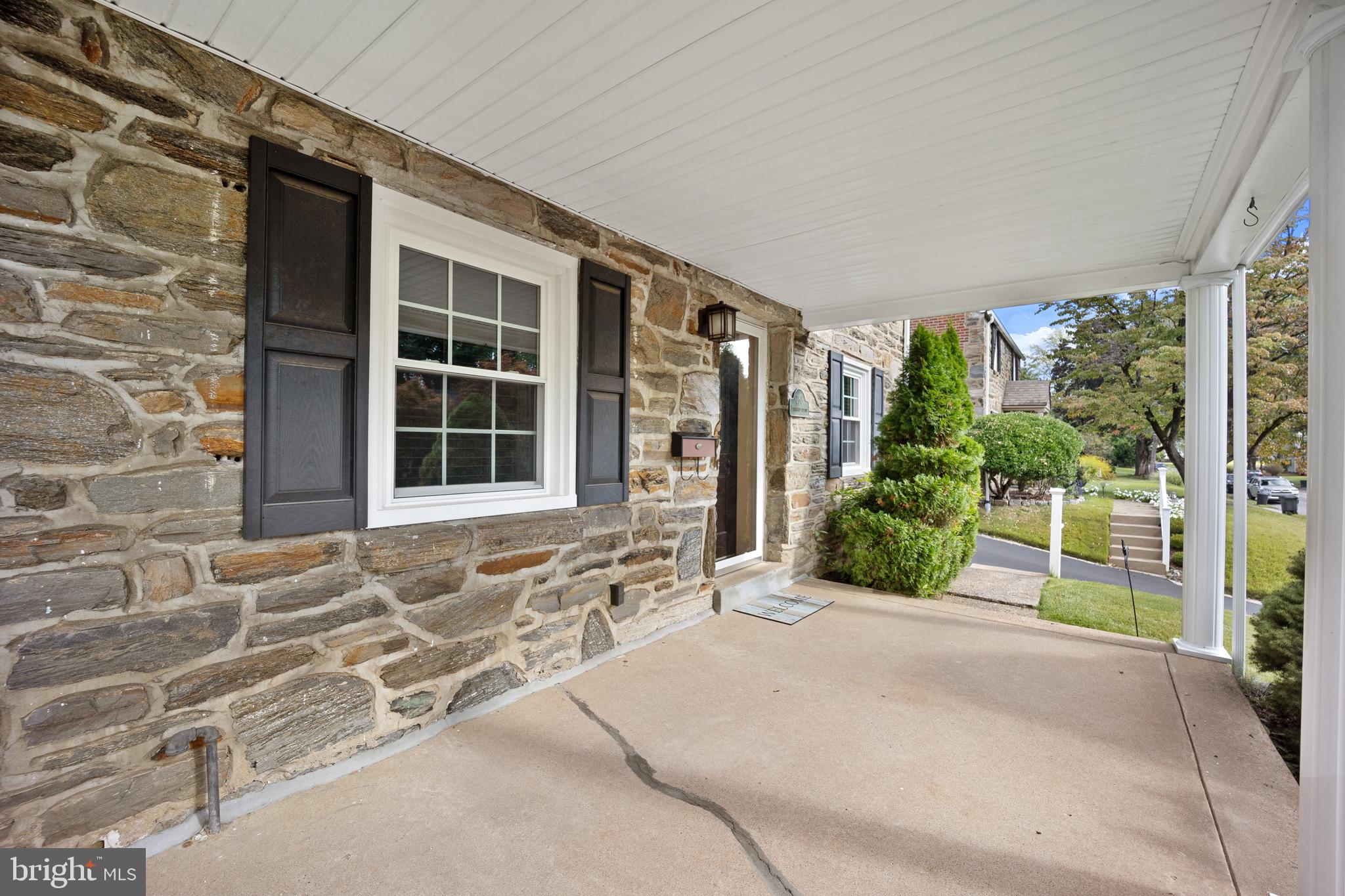 268 Beechwood Avenue Springfield, PA 19064 - Photo 3 of 36 a front view of a house with a yard and potted plants