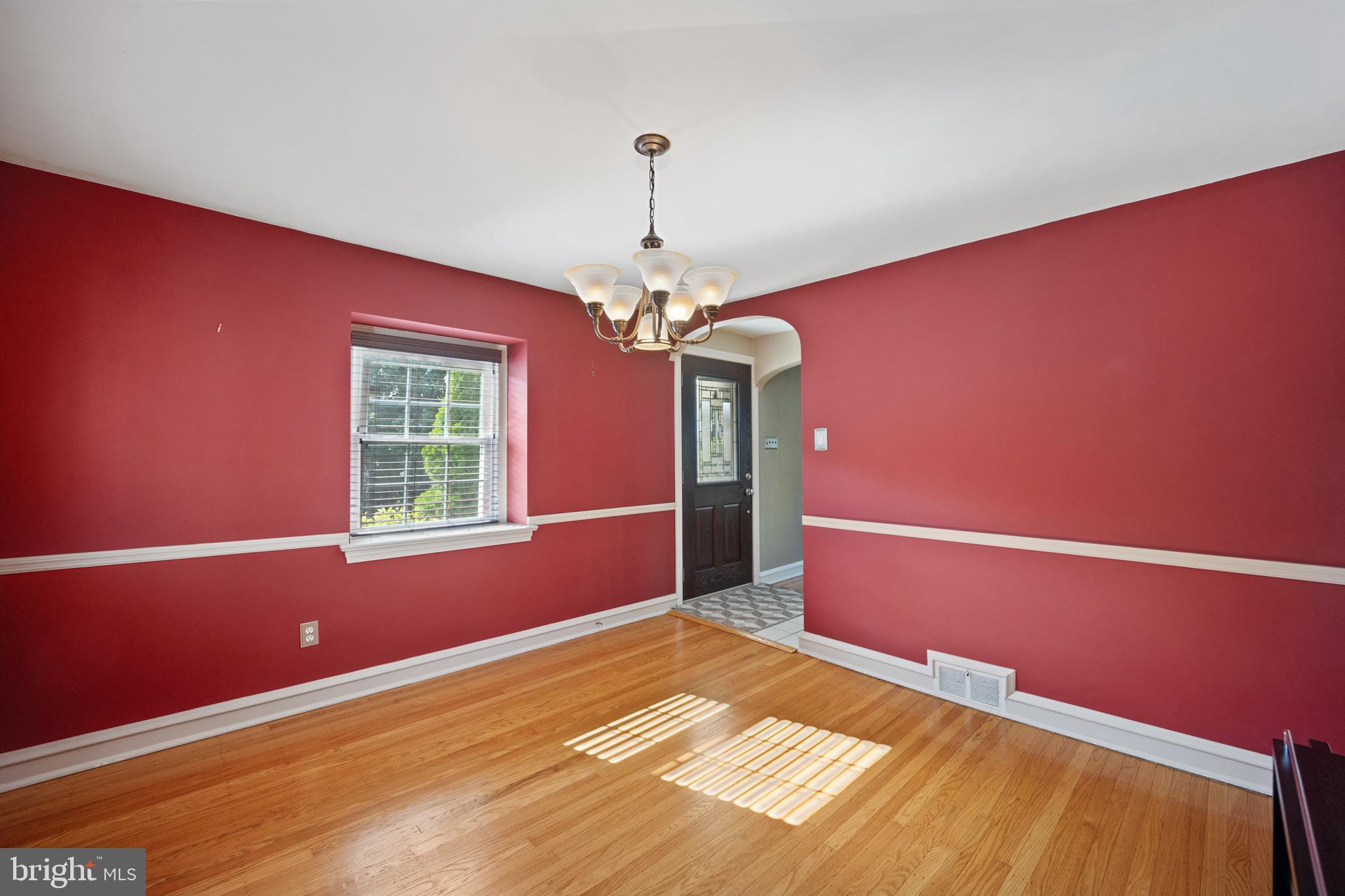268 Beechwood Avenue Springfield, PA 19064 - Photo 7 of 36 a bed room with a bed and a chandelier