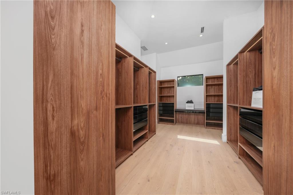 721 Springline Drive Naples, FL 34102 - Photo 20 of 50 a view of kitchen with furniture and wooden floor