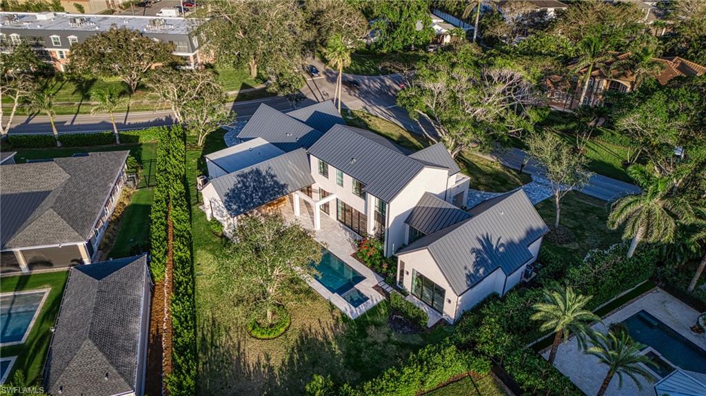 721 Springline Drive Naples, FL 34102 - Photo 50 of 50 an aerial view of a house