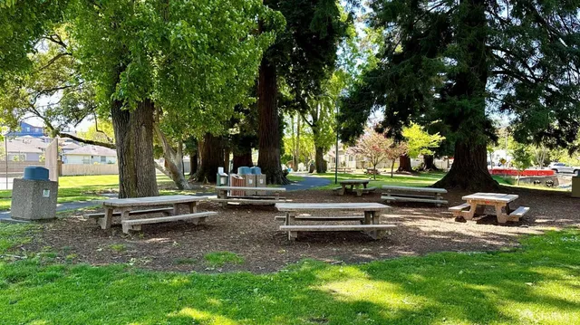 a view of a street in front of a building