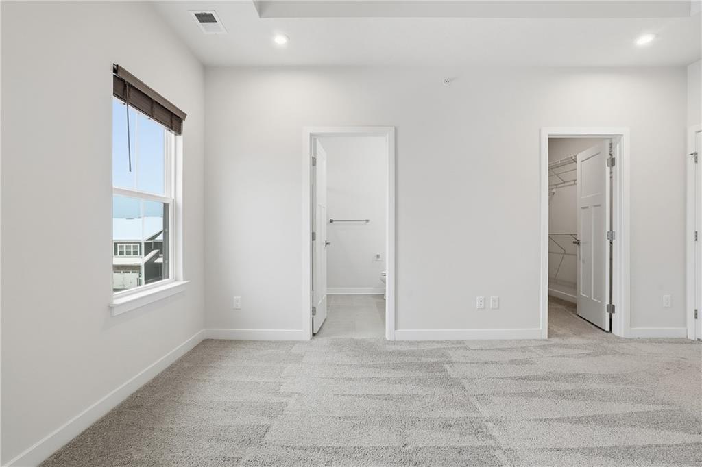 9002 Hickory Road Gibsonia, PA 15044 - Photo 21 of 46 an empty room with windows and closet