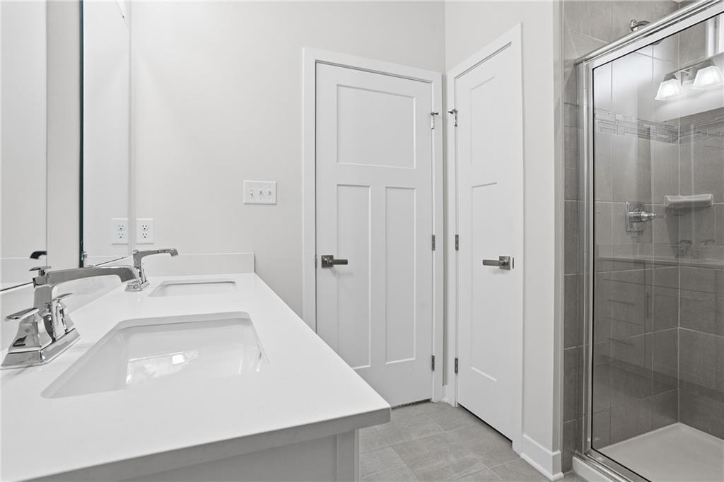 9002 Hickory Road Gibsonia, PA 15044 - Photo 23 of 46 a bathroom with a sink a toilet and shower