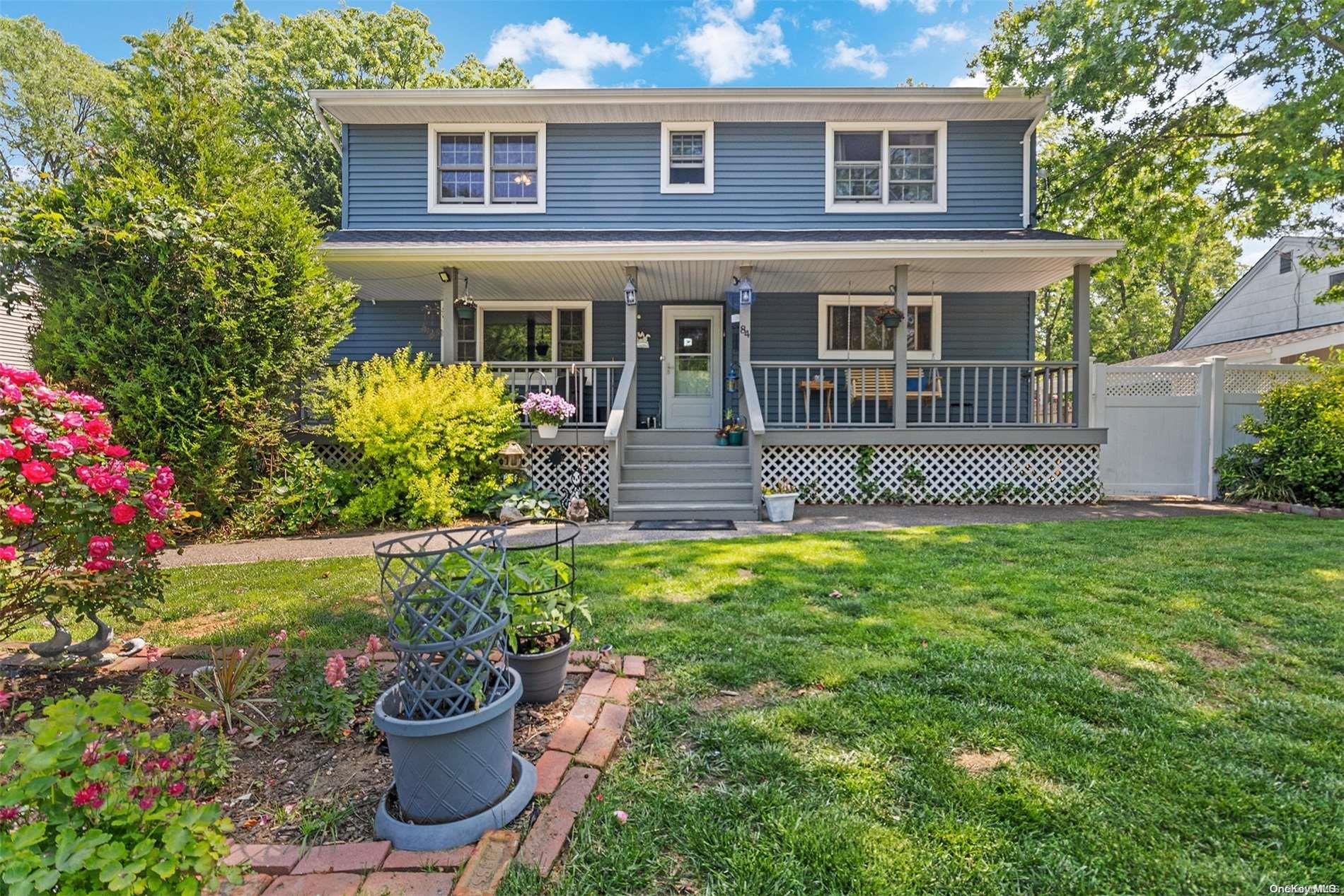 84 46th Street Islip, NY 11751 - Photo 1 of 1 a house view with a garden space