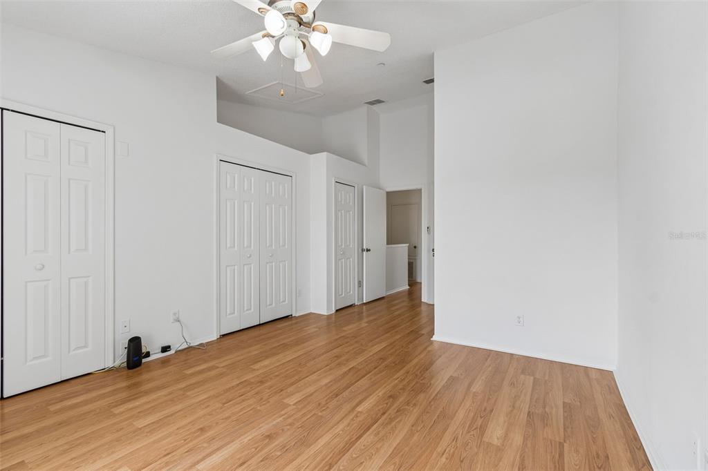 382 Countryside Key Boulevard Oldsmar, FL 34677 - Photo 37 of 58 a view of an empty room with wooden floor