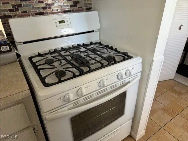 a close view of stove top oven with stove