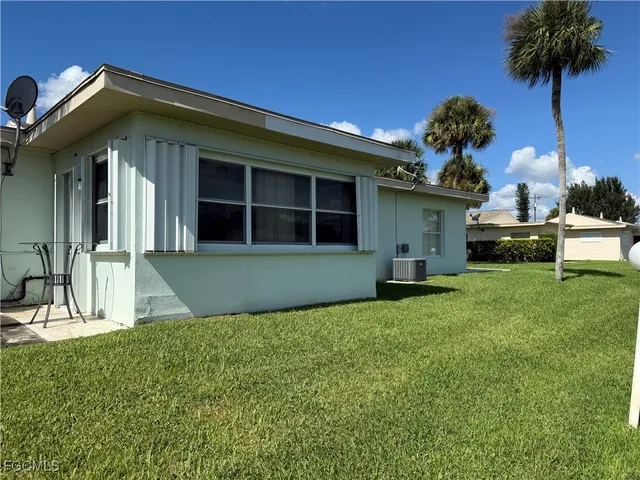 a view of a house with a garden