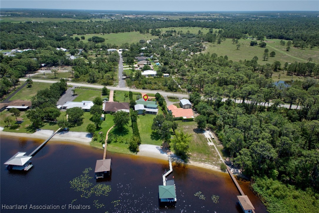 7411 Sparta Road Sebring, FL 33875 - Photo 47 of 50 an aerial view of a house with a yard