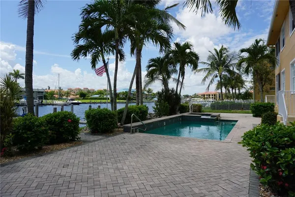 a view of a lake with a yard