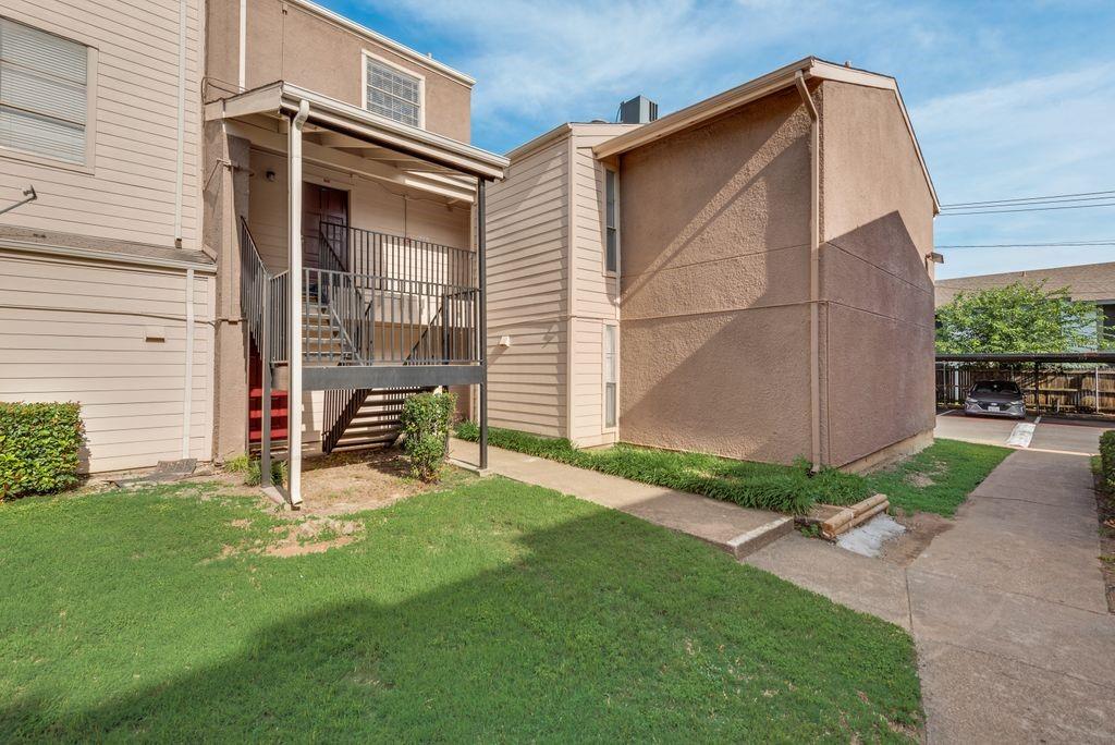 5514 Boca Raton Boulevard, Unit 438 Fort Worth, TX 76112 - Photo 1 of 25 a view of backyard with a barn and a large window