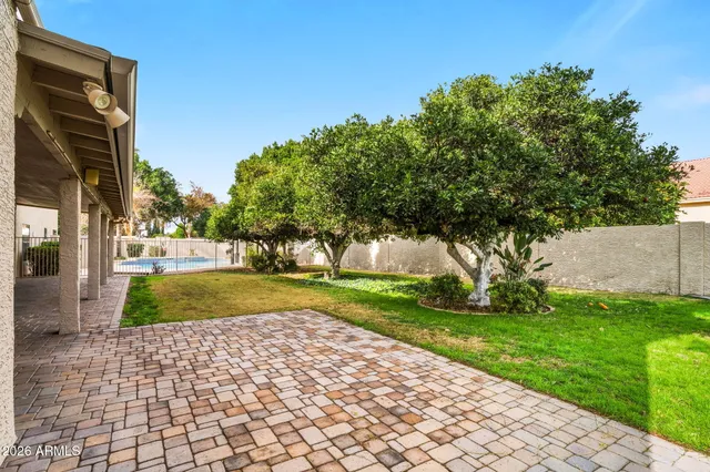 a view of swimming pool with seating space