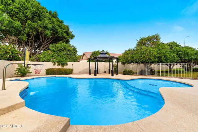 a view of a house with swimming pool