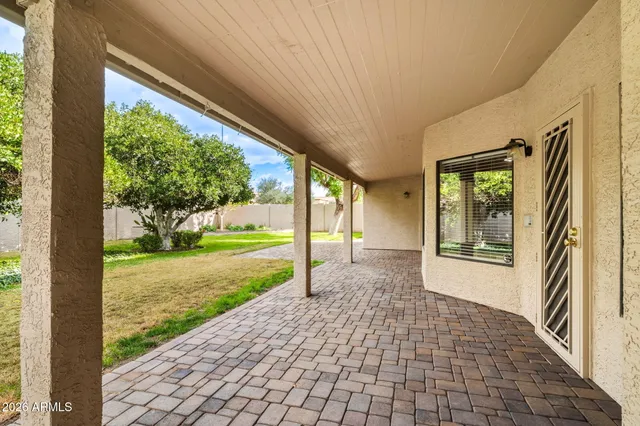 a view of a porch with a big yard