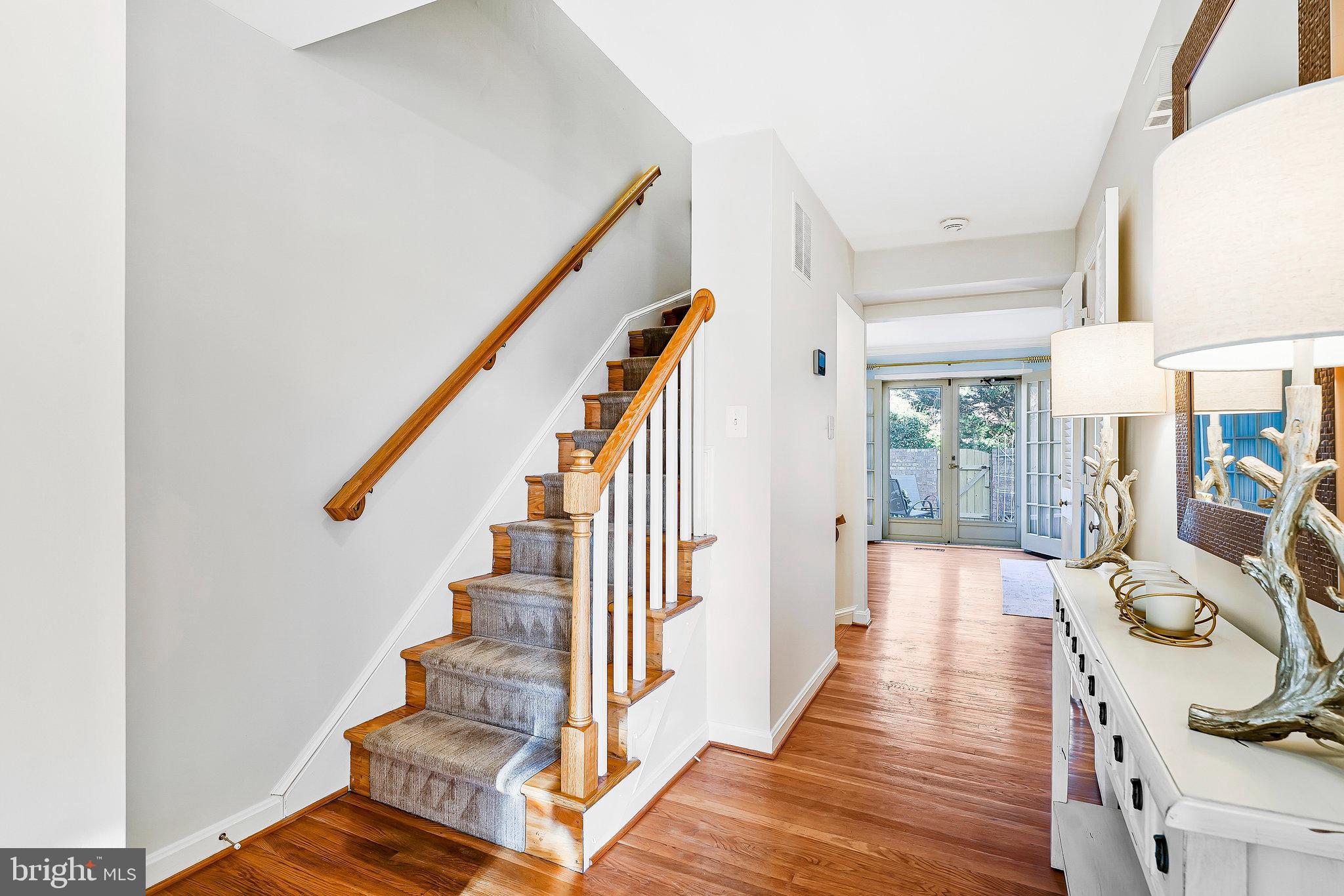 7346 Eldorado Street McLean, VA 22102 - Photo 4 of 48 a view of entryway and hall with wooden floor