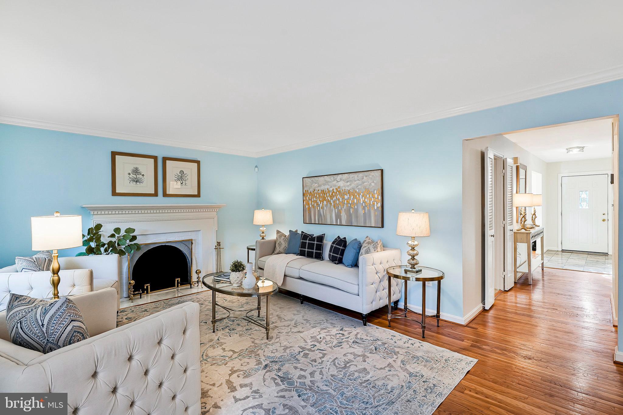 7346 Eldorado Street McLean, VA 22102 - Photo 10 of 48 a living room with furniture and a fireplace