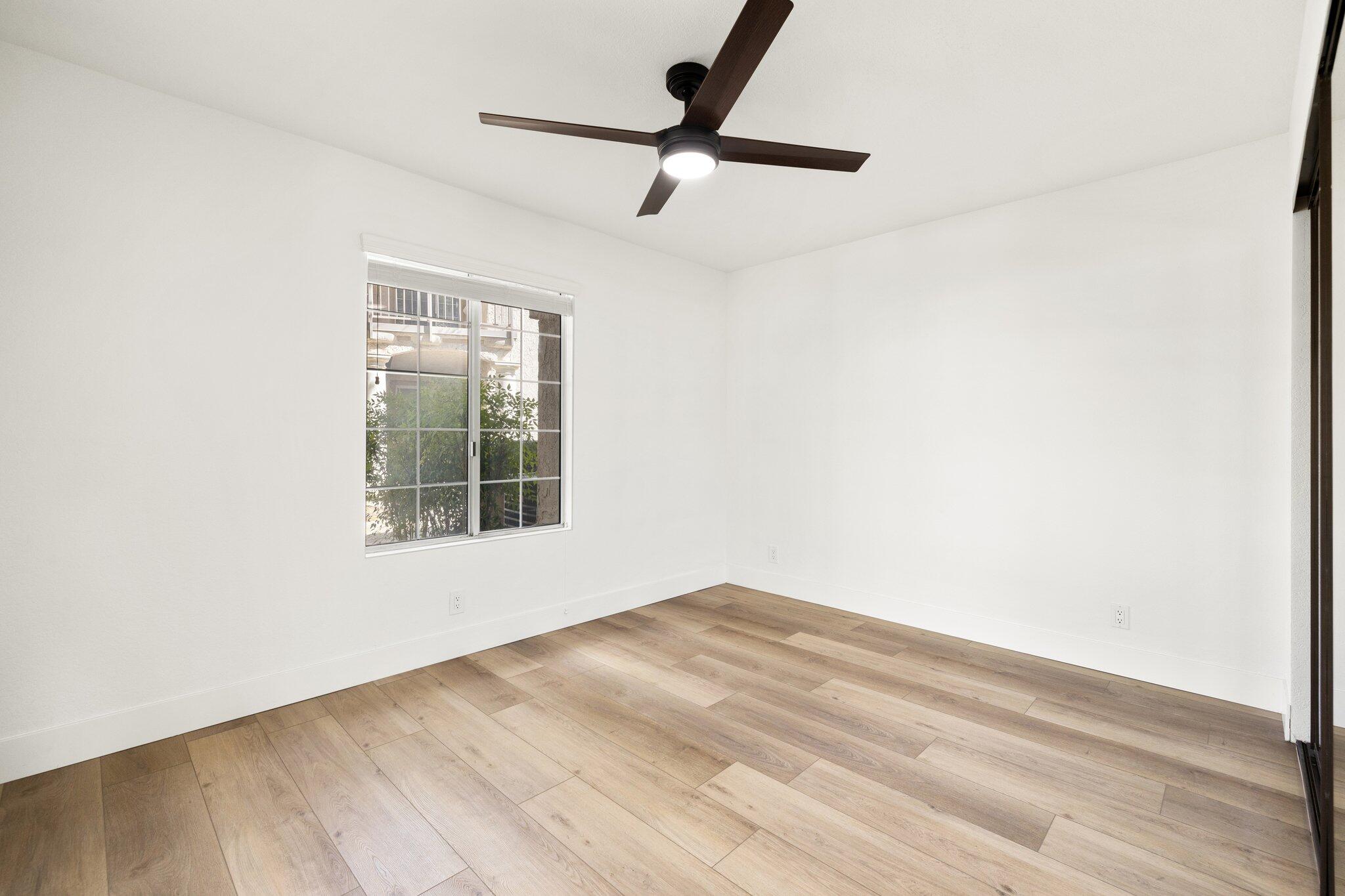 505 South Farrell Drive, Unit A3 Palm Springs, CA 92264 - Photo 17 of 43 a view of a room with a wooden floor and a window