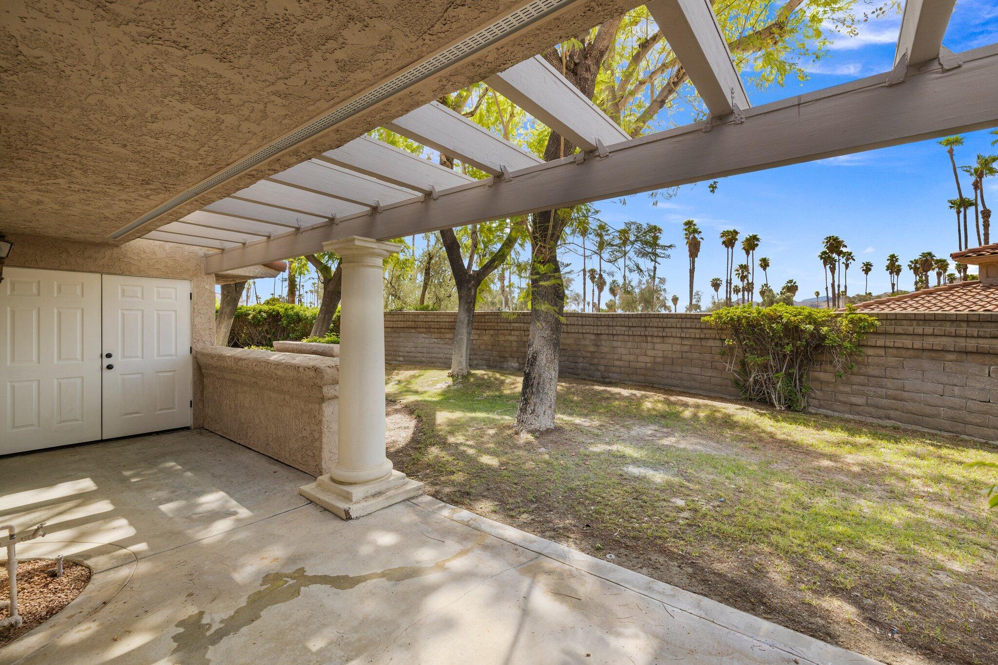 505 South Farrell Drive, Unit A3 Palm Springs, CA 92264 - Photo 25 of 43 a view of a room with a garage