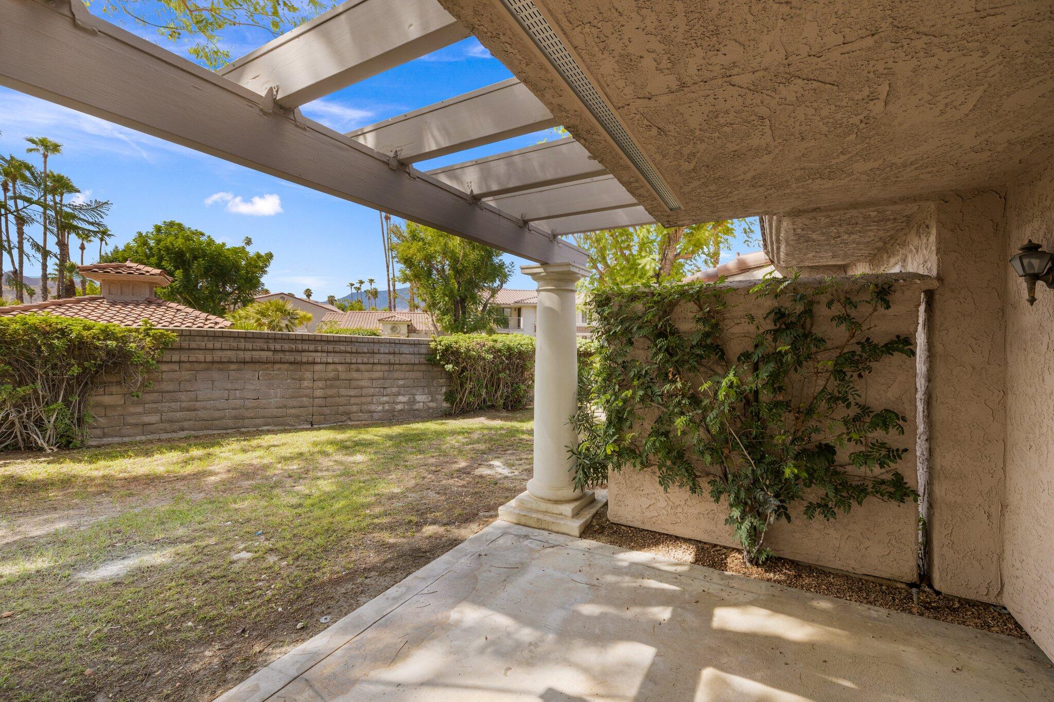 505 South Farrell Drive, Unit A3 Palm Springs, CA 92264 - Photo 26 of 43 a view of a backyard of the house