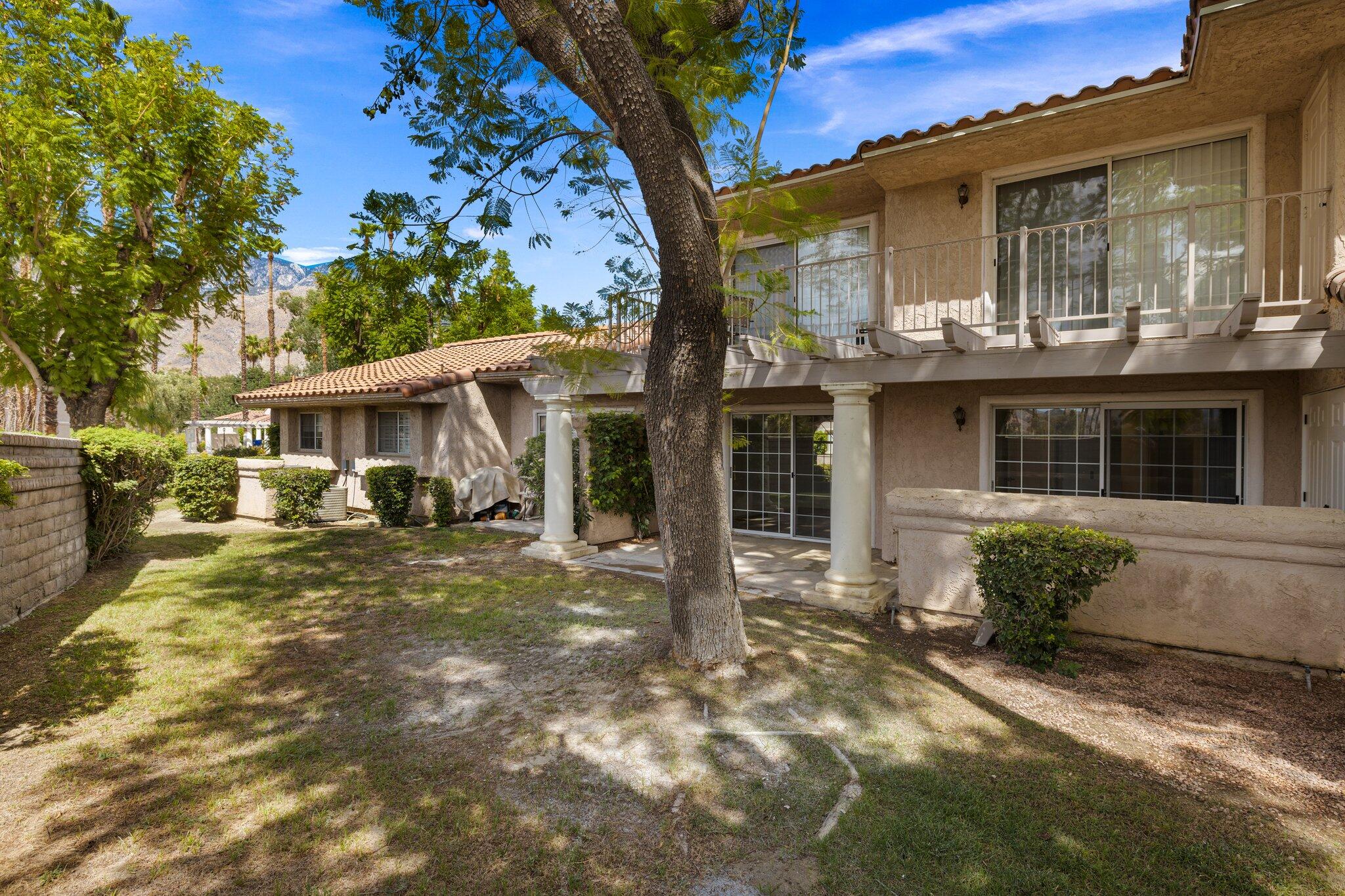 505 South Farrell Drive, Unit A3 Palm Springs, CA 92264 - Photo 29 of 43 a view of a house with a chairs in patio