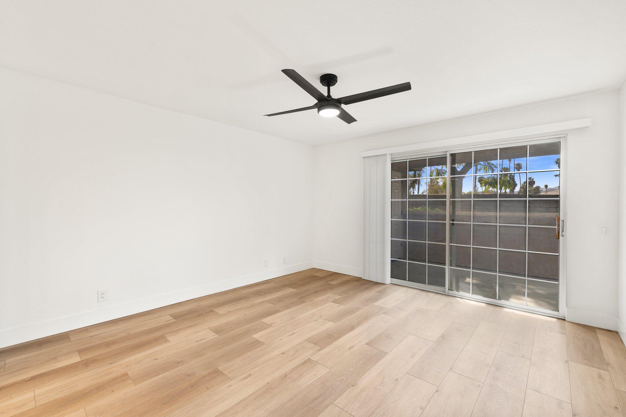 505 South Farrell Drive, Unit A3 Palm Springs, CA 92264 - Photo 3 of 43 an empty room with a empty space and a window