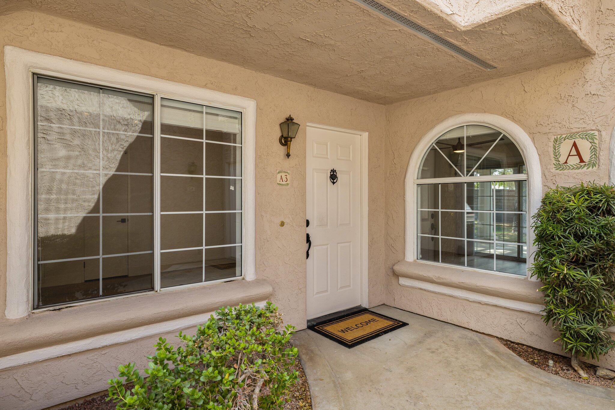 505 South Farrell Drive, Unit A3 Palm Springs, CA 92264 - Photo 33 of 43 a front view of a house with a window