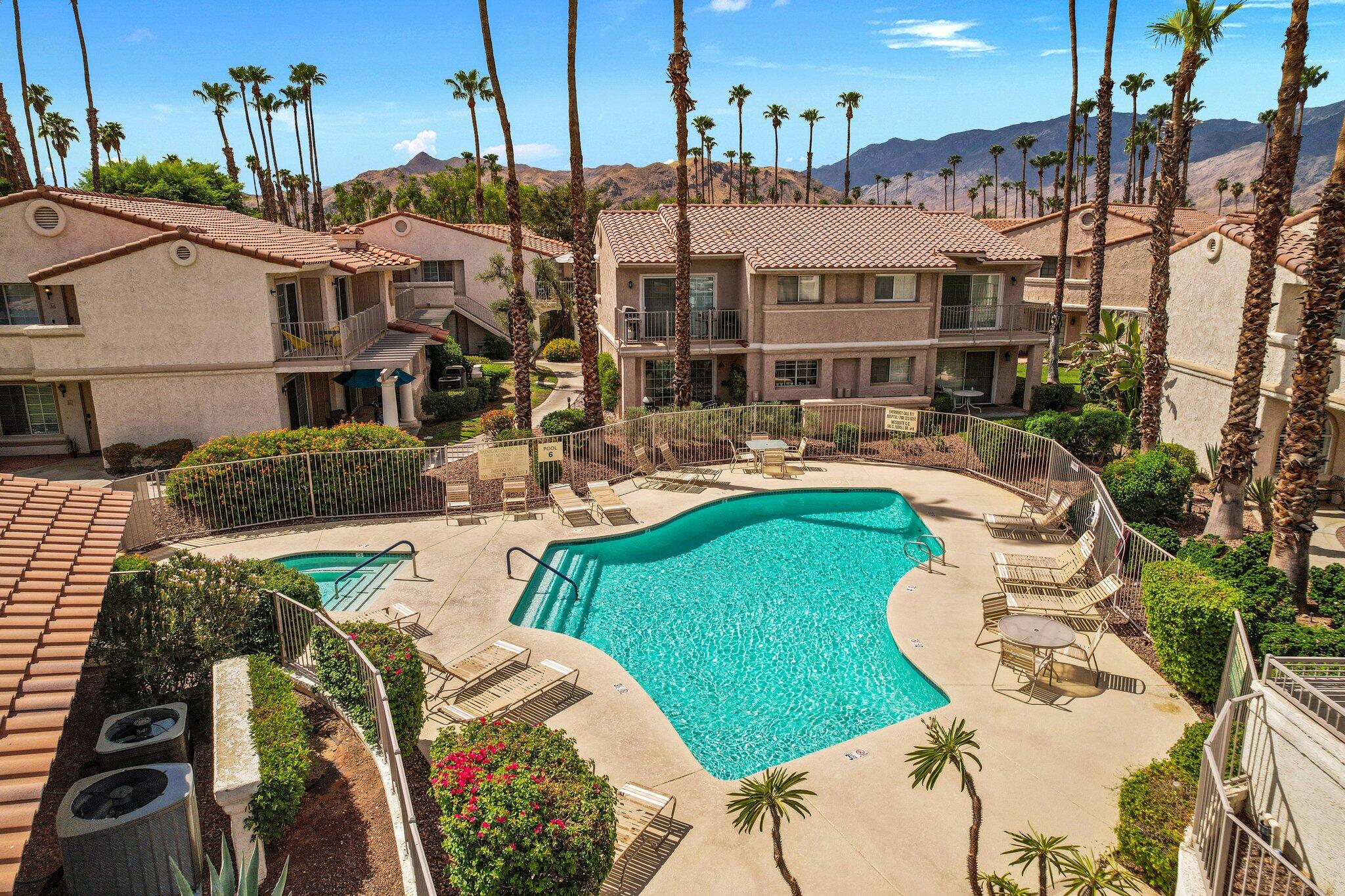 505 South Farrell Drive, Unit A3 Palm Springs, CA 92264 - Photo 39 of 43 a view of a swimming pool with outdoor seating