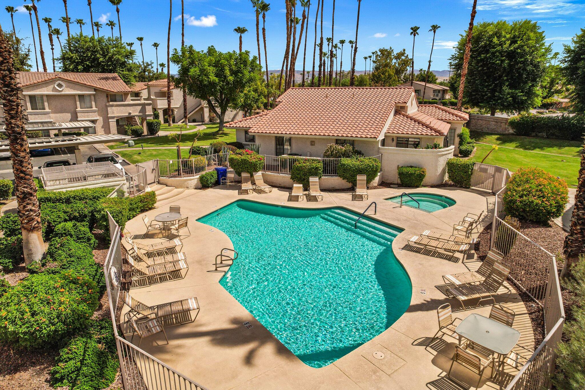 505 South Farrell Drive, Unit A3 Palm Springs, CA 92264 - Photo 5 of 43 a view of a table and chairs in patio