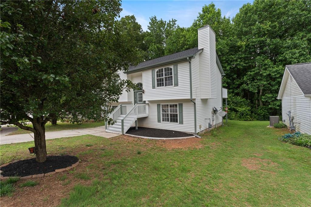 3602 Bristol Overlook Rex, GA 30273 - Photo 37 of 37 a view of a house with backyard and trees