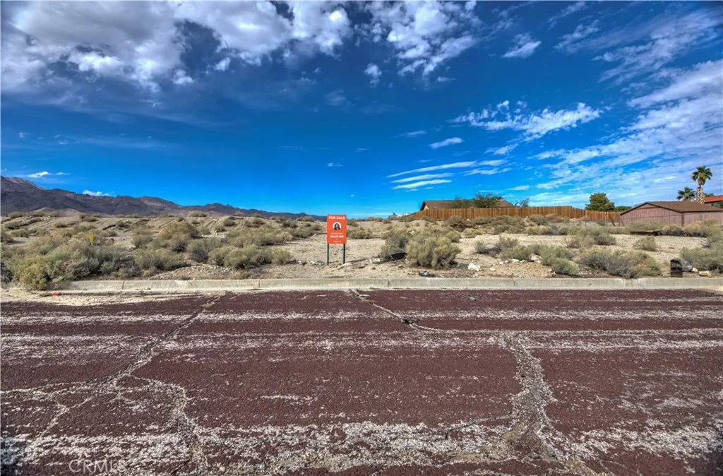 0 Locust Street Trona, CA 93562 - Photo 2 of 10 a view of a field with large trees
